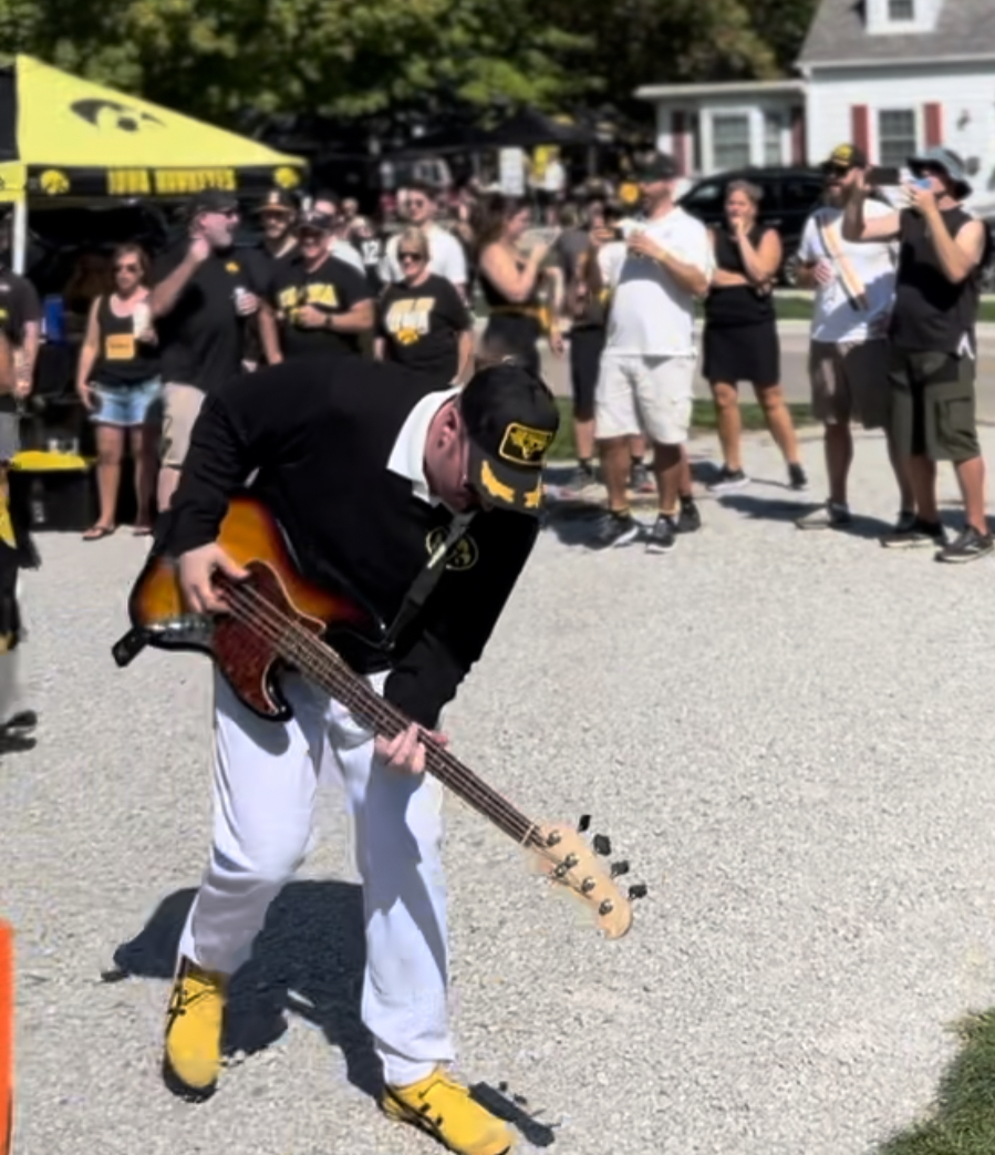 Michael Van Hayden performing in front of the Vanbulance at a tailgate for the Iowa vs. Michigan State game