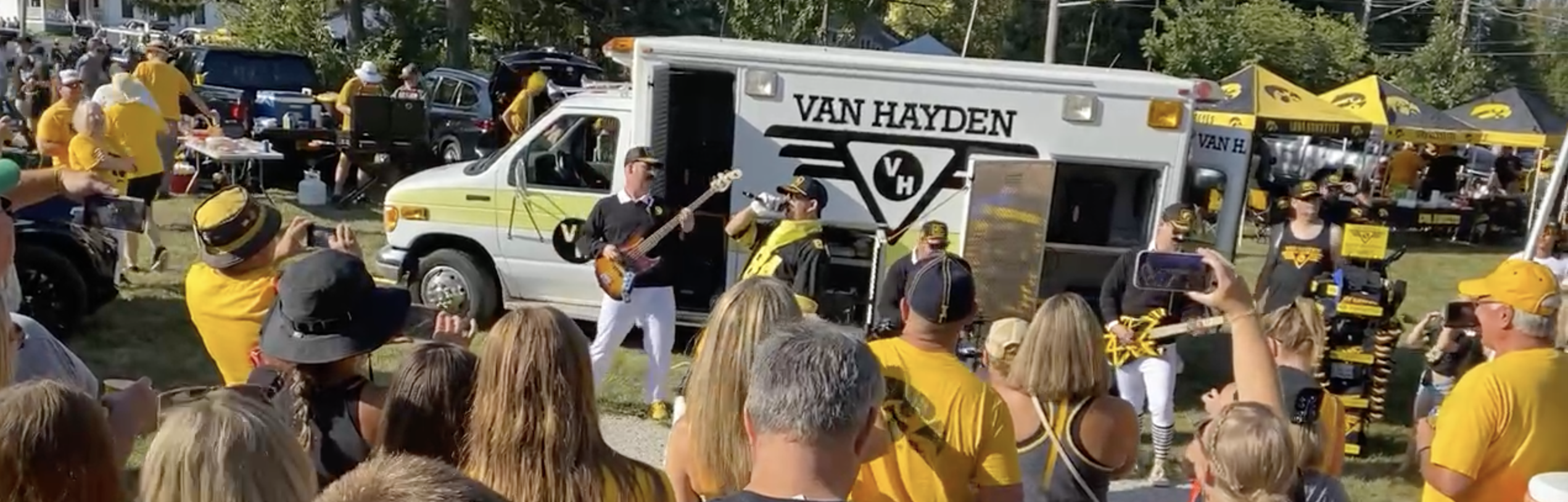 Van Hayden Band Performing in front of a large crowd with their Vanbulance